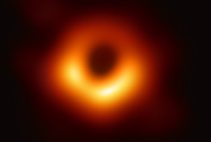 black-hole-a-consensus The first-ever image of a black hole was released Wednesday by a consortium of researchers, showing the "black hole at the center of galaxy M87, outlined by emission from hot gas swirling around it under the influence of strong gravity near its event horizon."